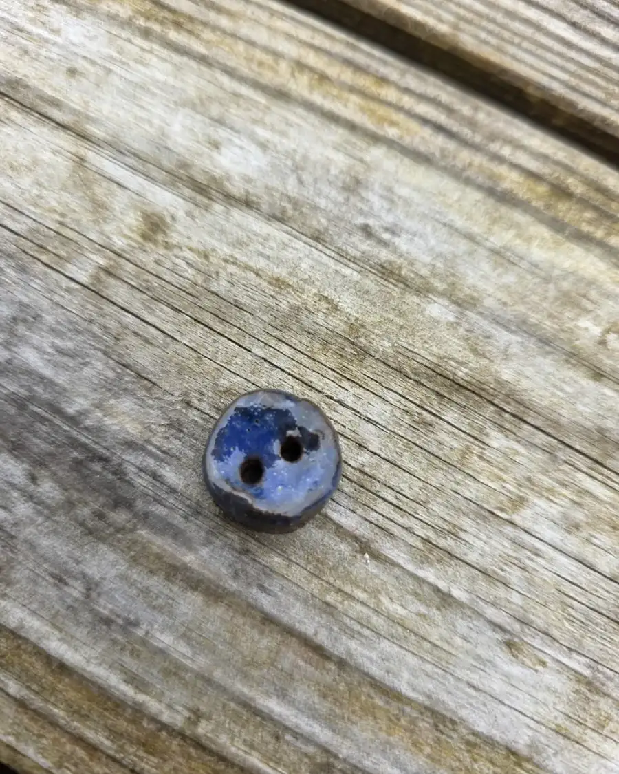 Ceramic button