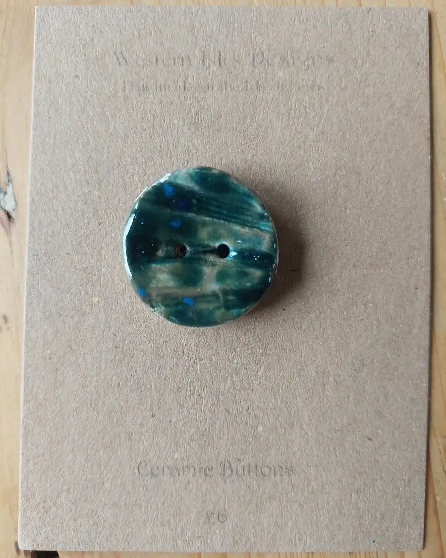Ceramic button