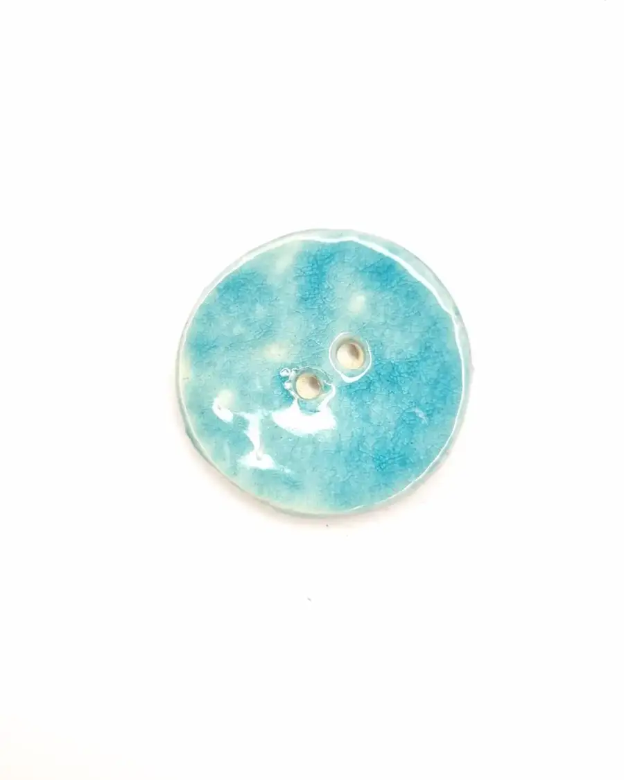 Ceramic button