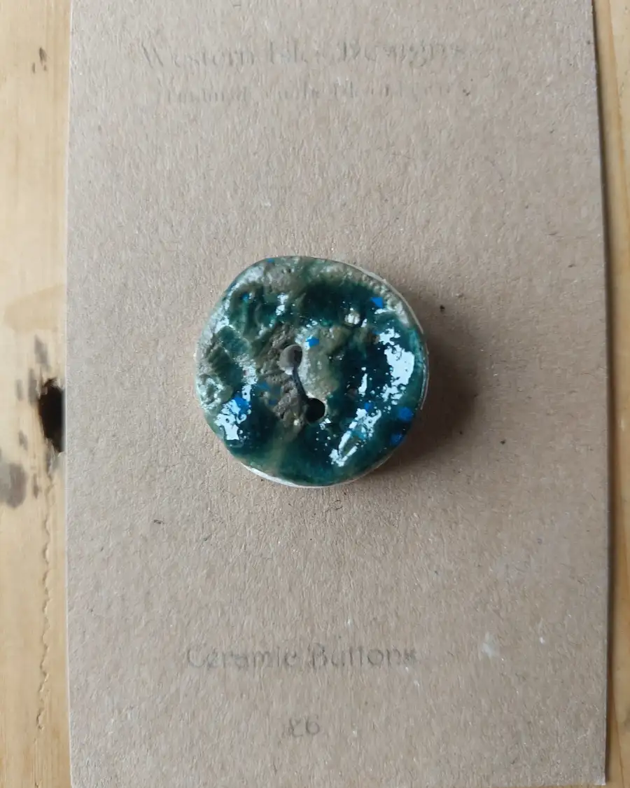 Ceramic button