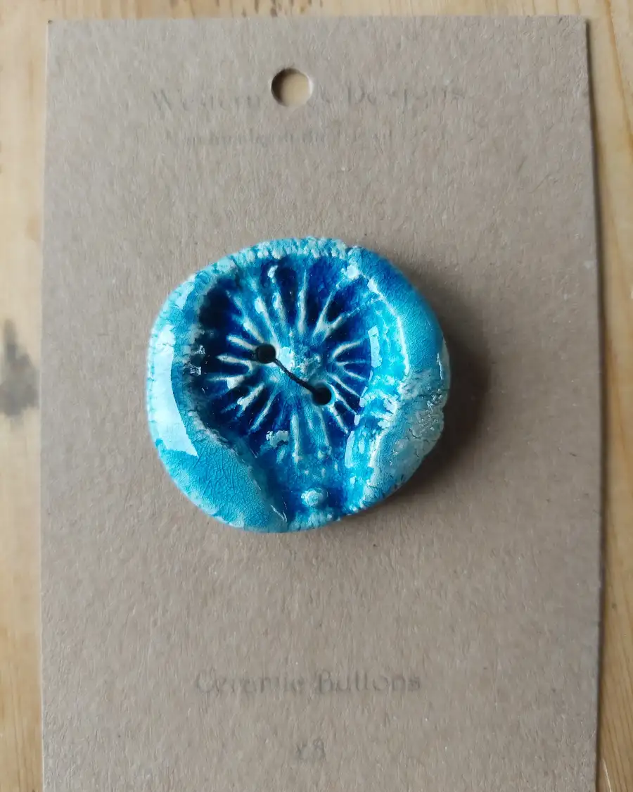 Ceramic button