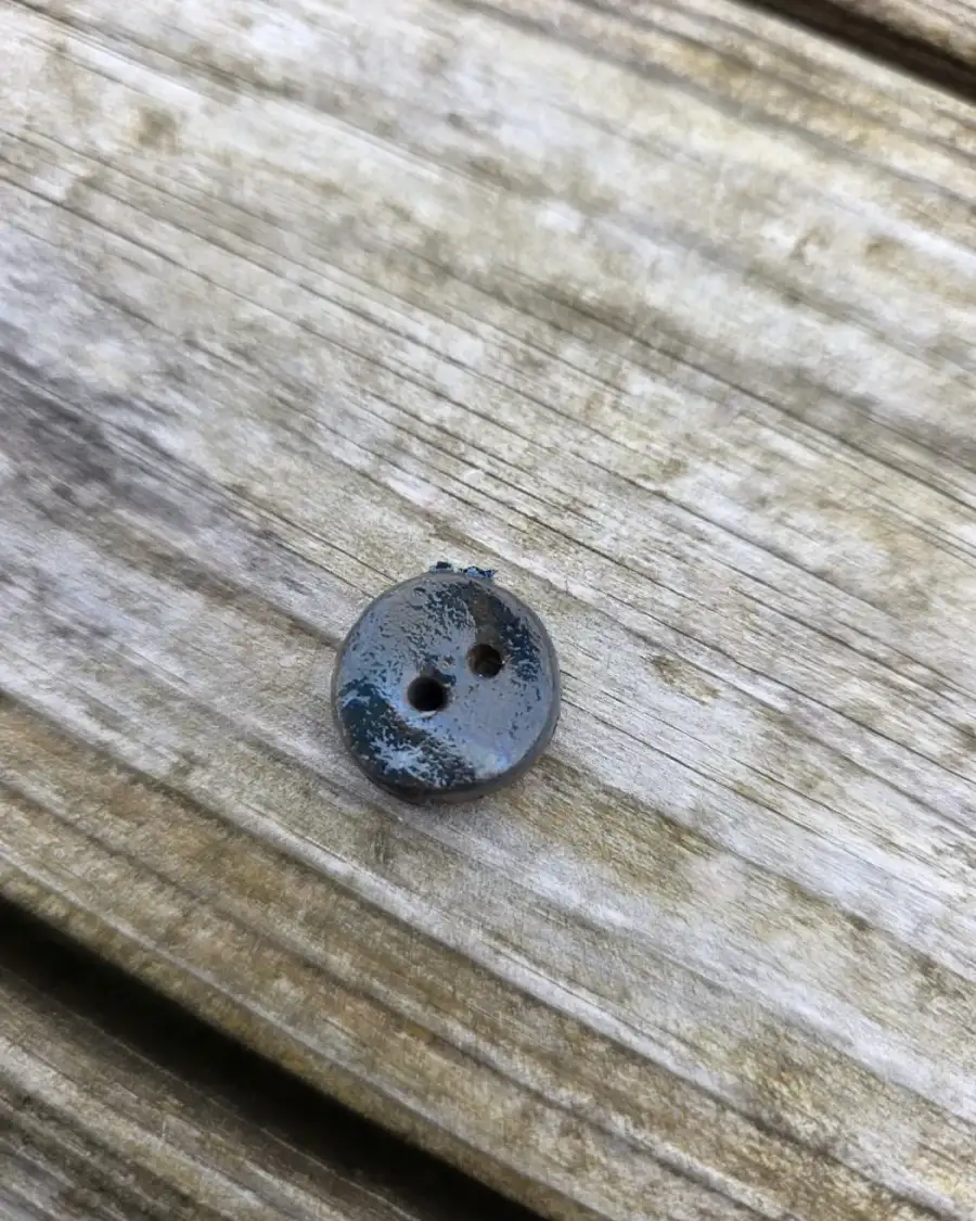 Ceramic button
