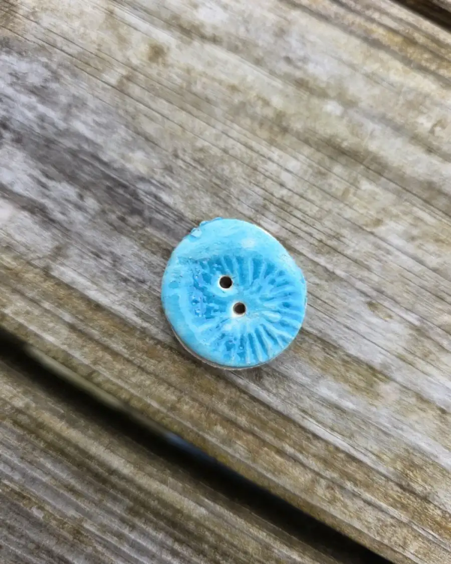 Ceramic button