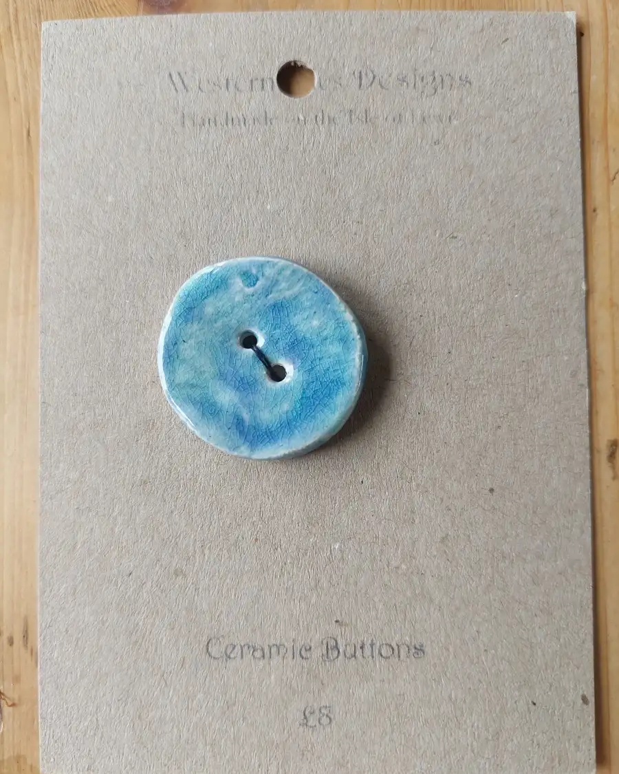 Ceramic button