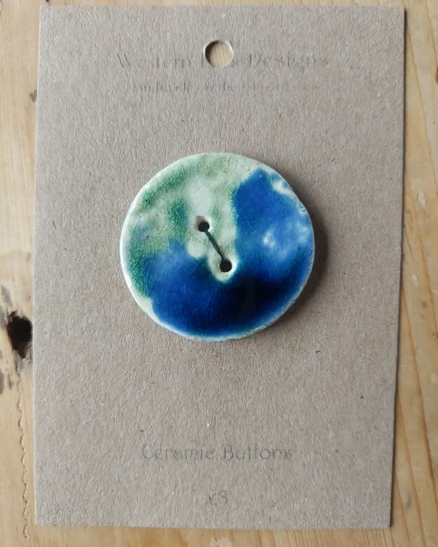 Ceramic button