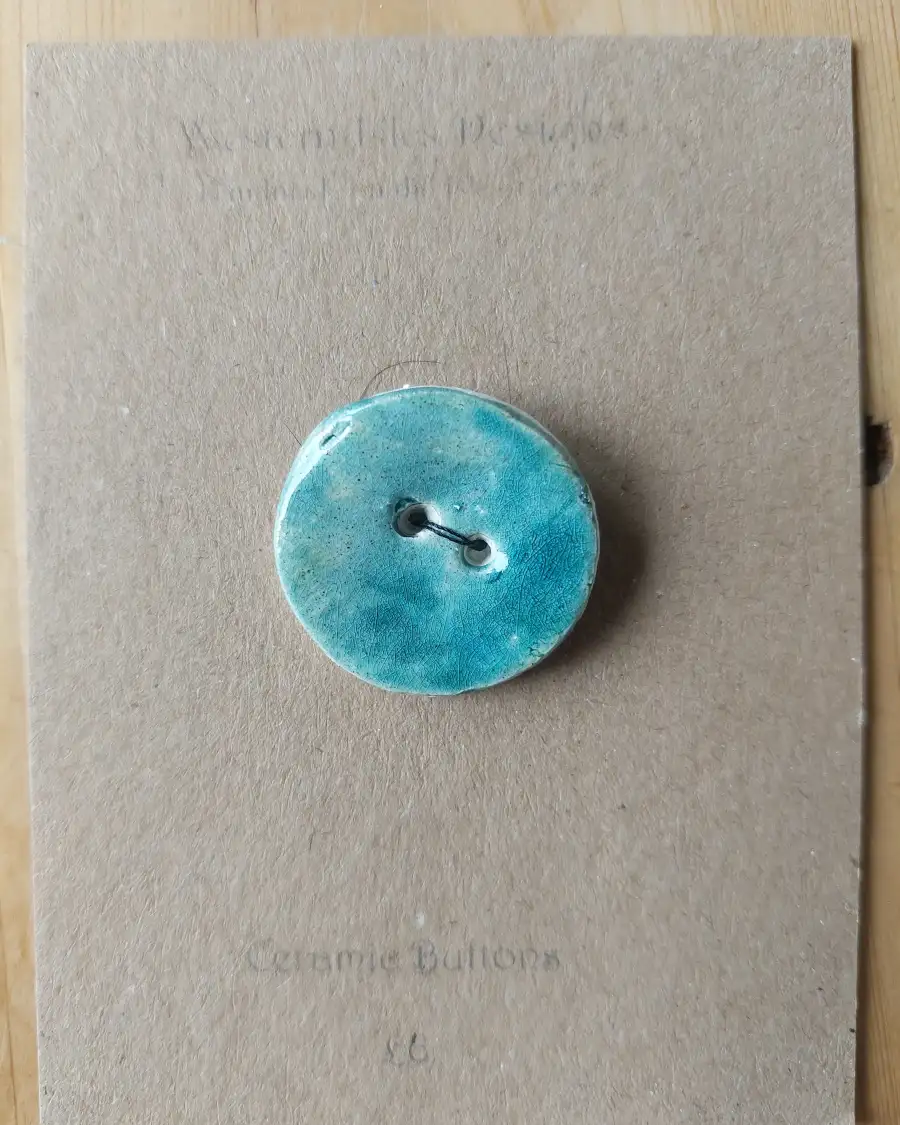 Ceramic button