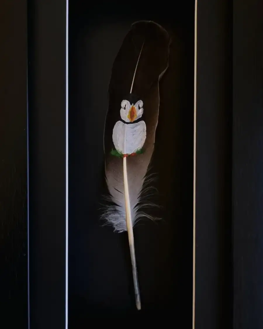 Puffin painted on a goose feather