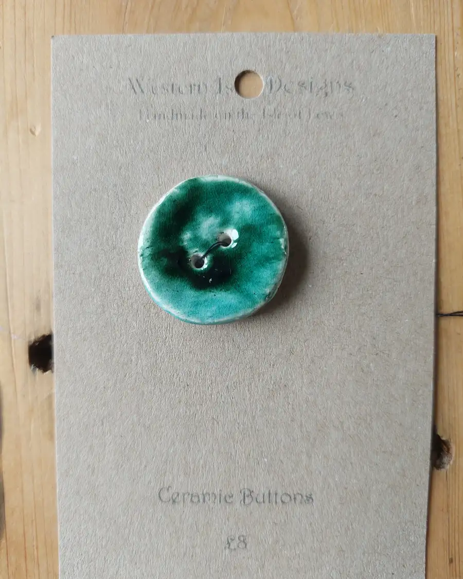 Ceramic button