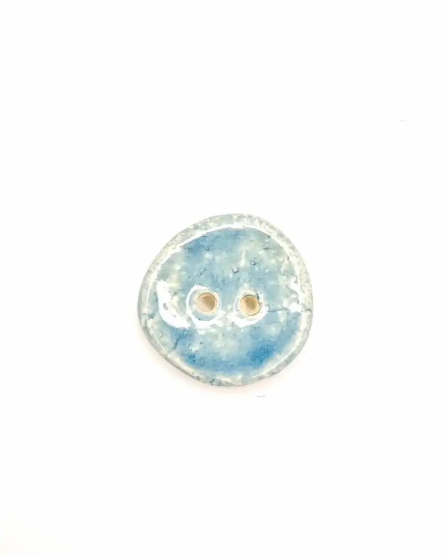 Ceramic button