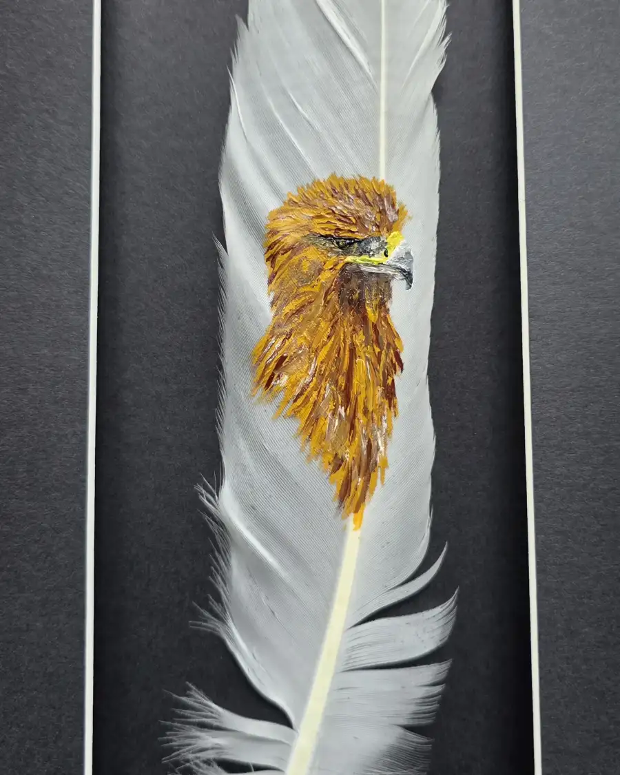 Golden eagle painted on a goose feather