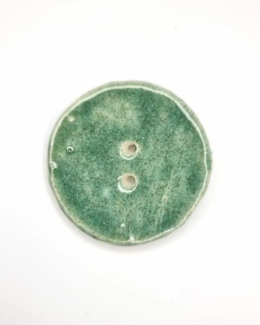 Ceramic button