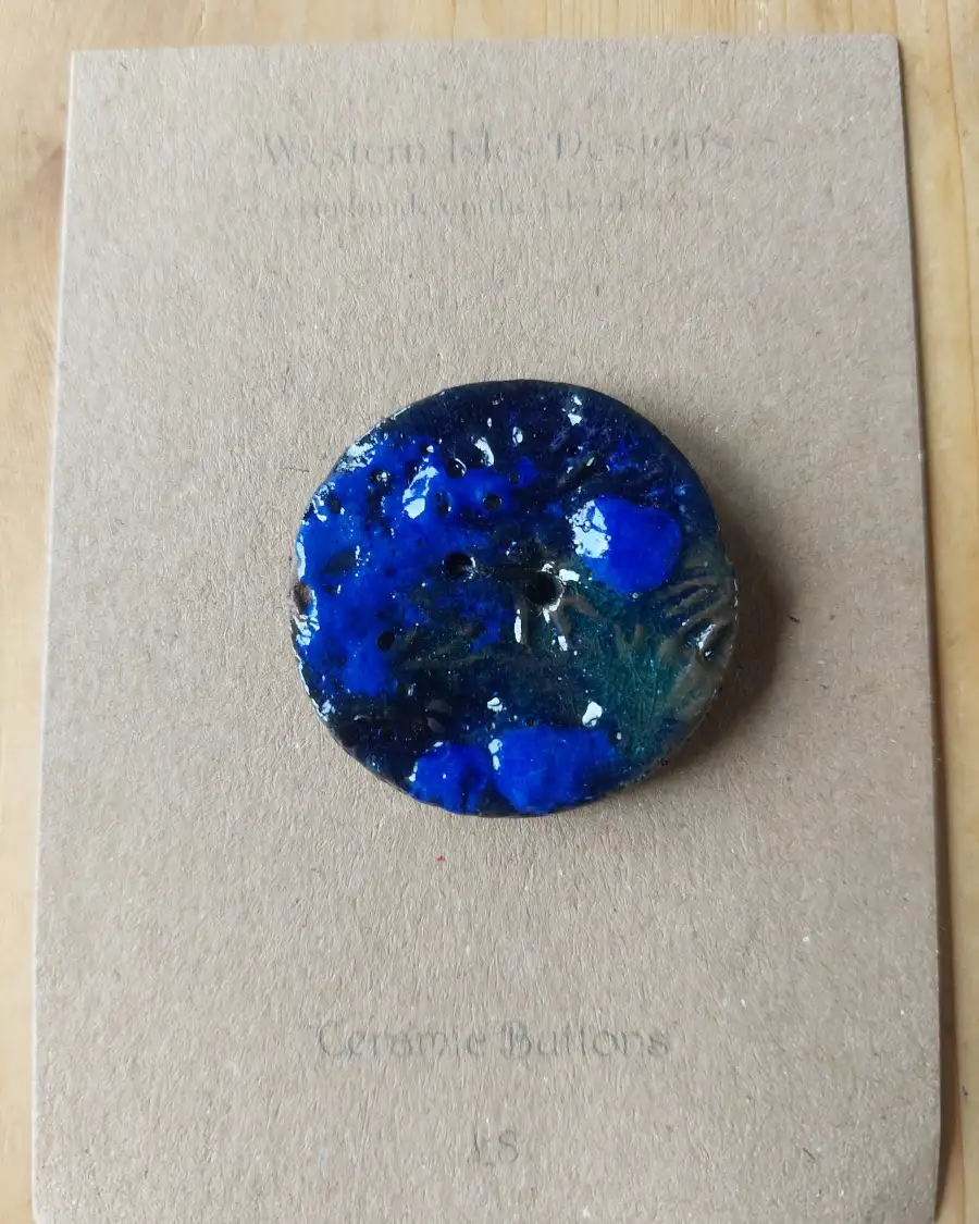Ceramic button
