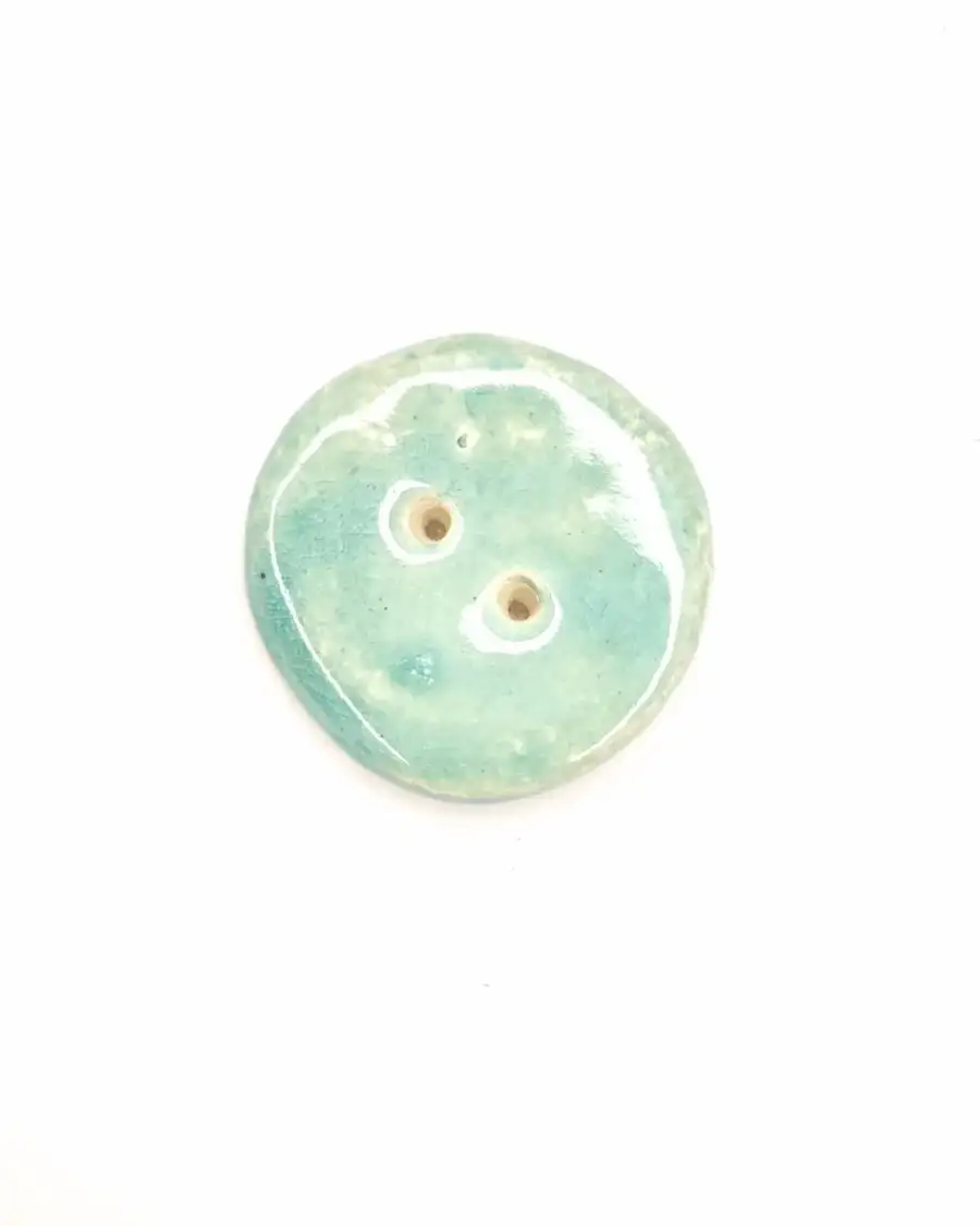Ceramic button