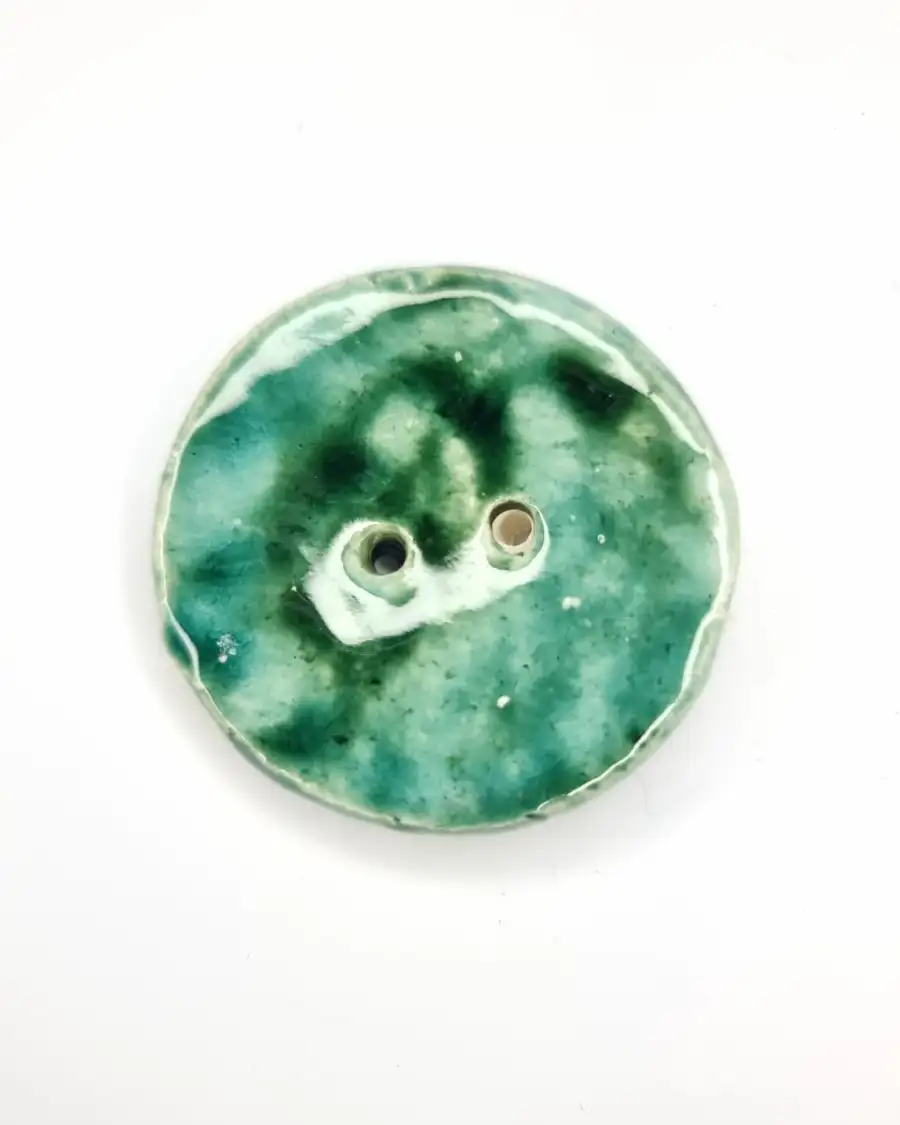 Ceramic button
