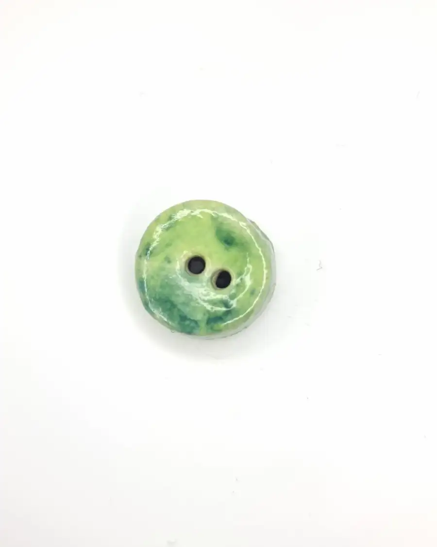 Ceramic button