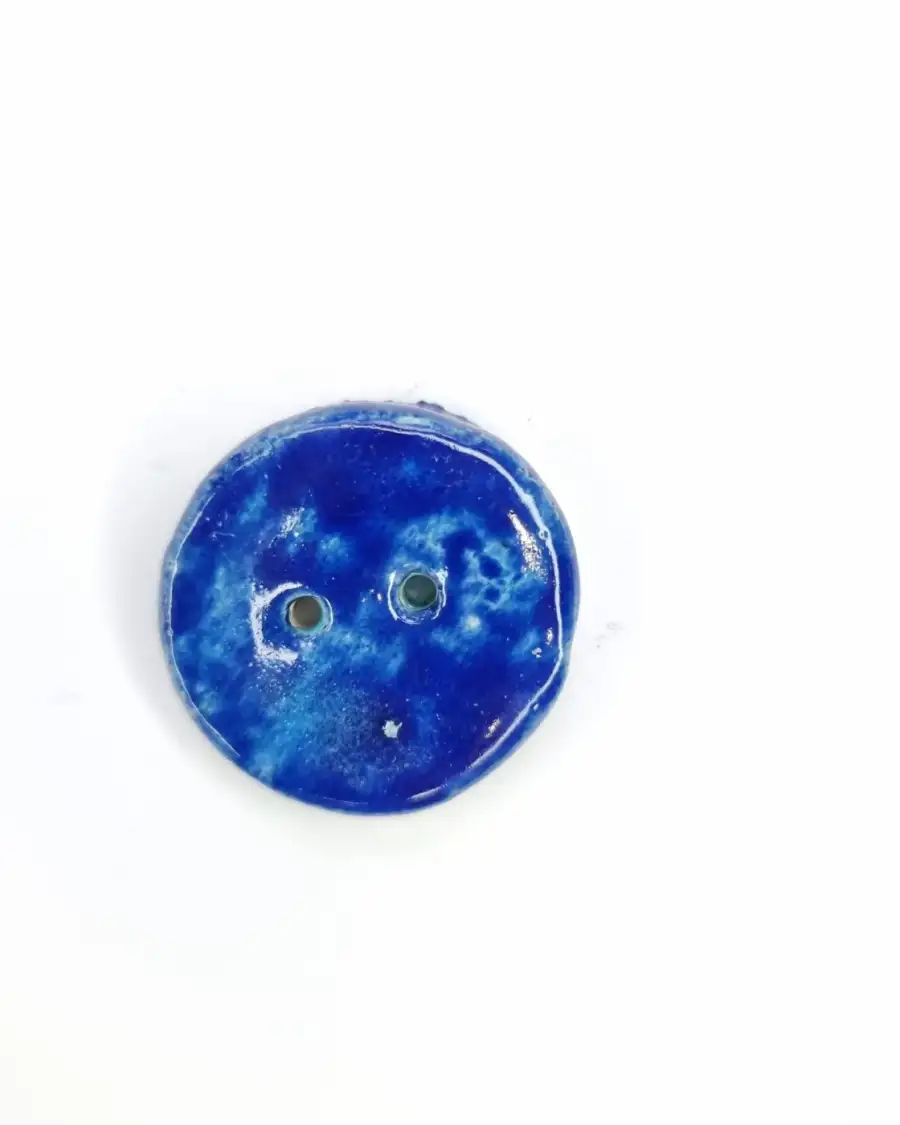 Ceramic button
