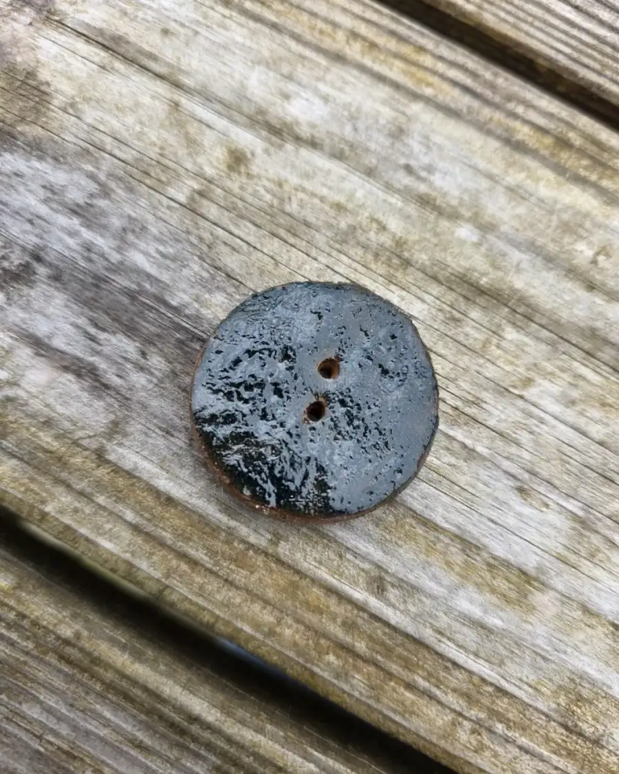 Ceramic button