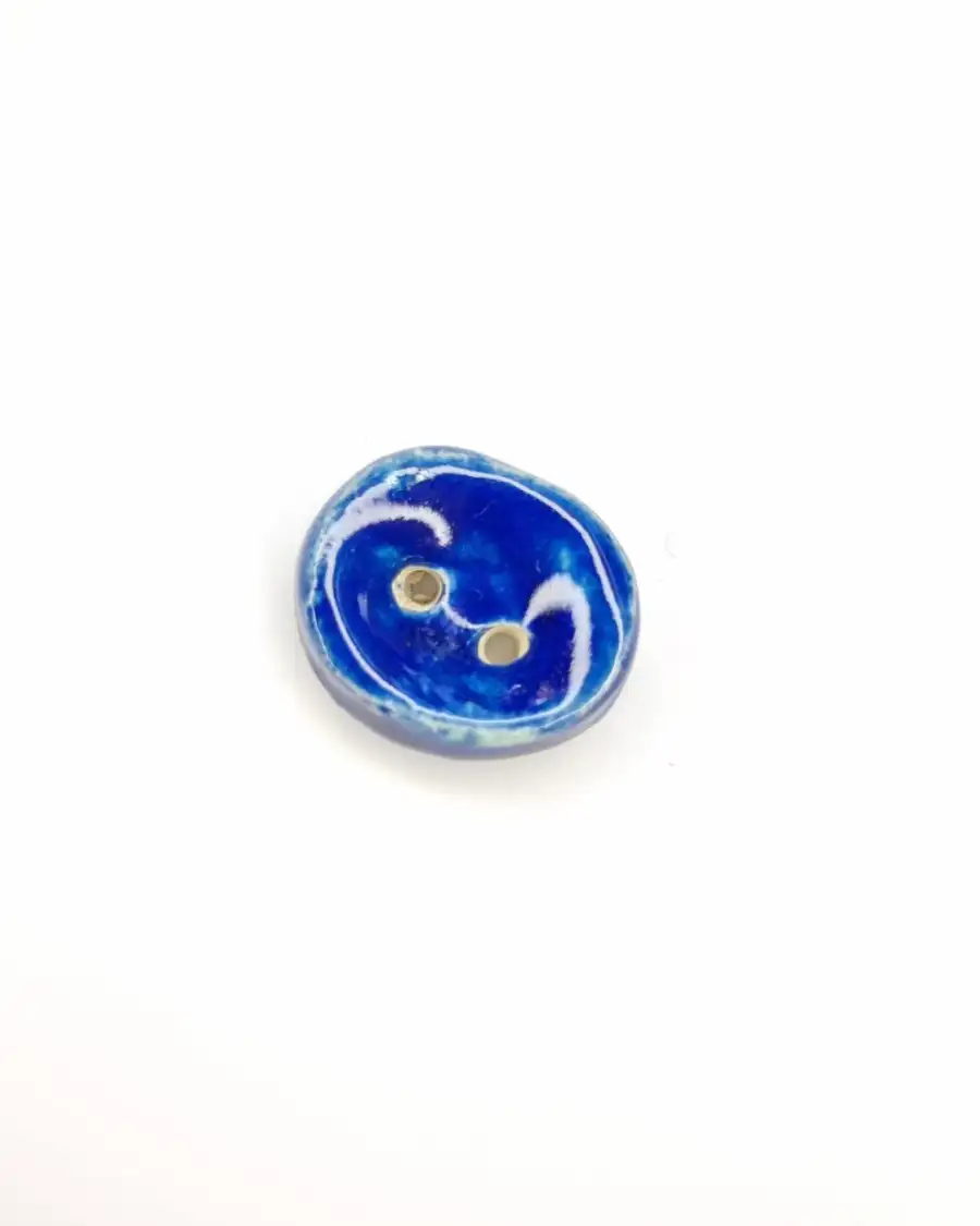 Ceramic button