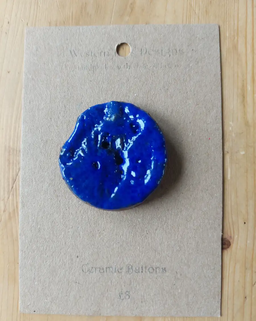 Ceramic button