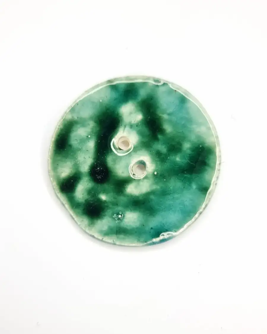 Ceramic button