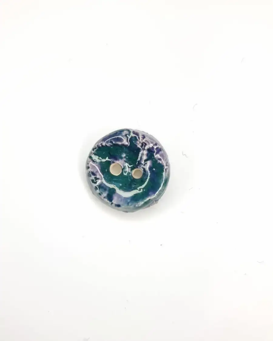 Ceramic button