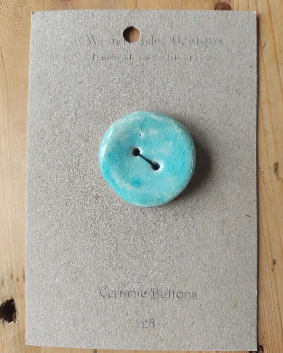 Ceramic button