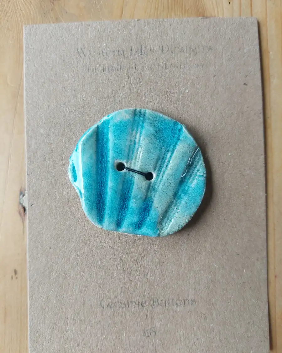 Ceramic button