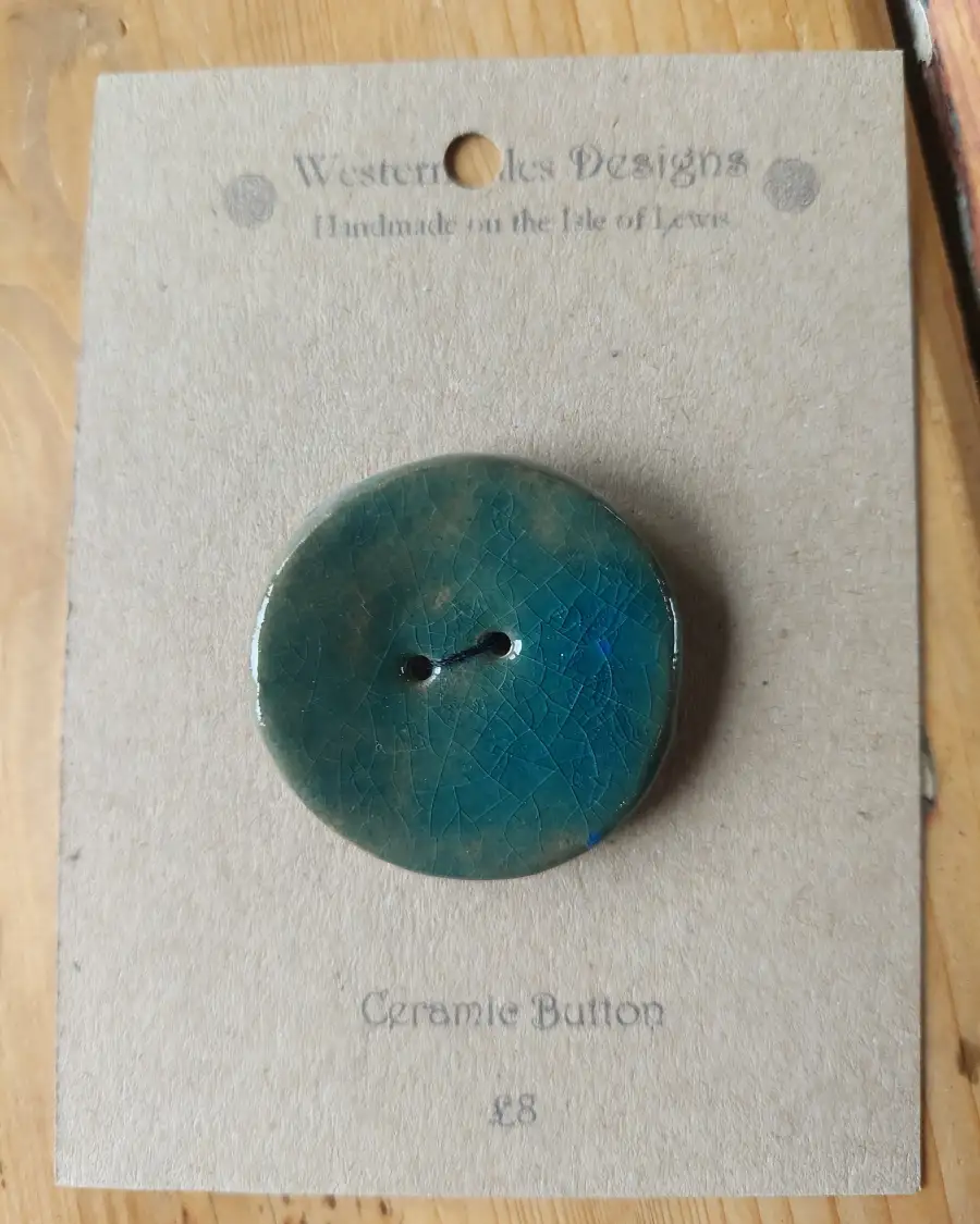 Ceramic button