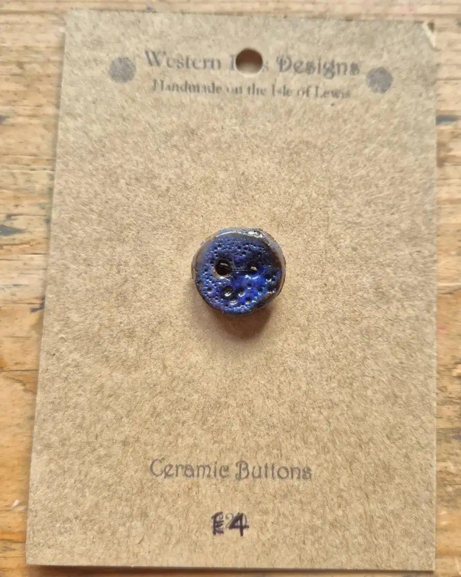 Ceramic button